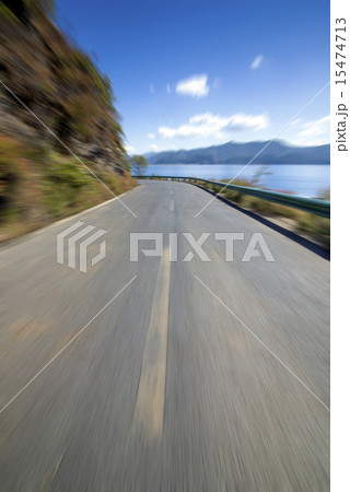 Quiet lakeside road 15474713