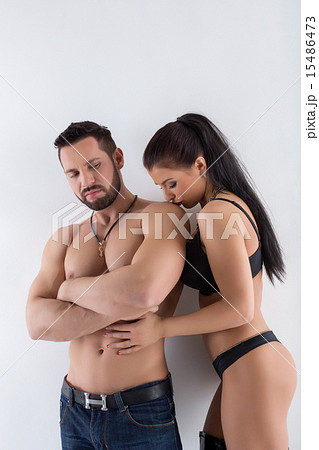 Image of smug bearded man and loving brunette 15486473