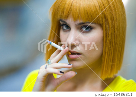 woman smoking cigarette 15486811