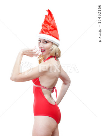 woman in  red bathing suit and cap of Santa Claus 15492166