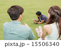 Students laying on the grass 15506340
