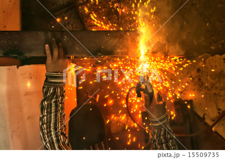 welding steel with spread spark lighting smoke 15509735
