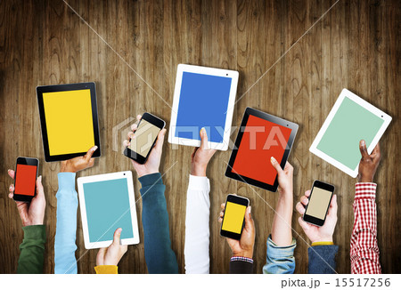Group of Hands Holding Digital Devices with Copy Space Group of Hands Holding Digital Devices with Copy Space 15517256