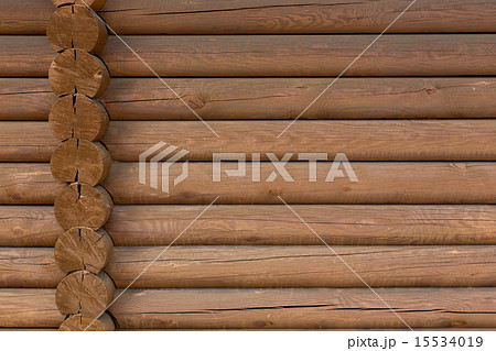 timbered wooden wall made from logs as background 15534019