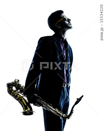 man saxophonist playing saxophone player silhouette man saxophonist playing saxophone player silhouette 15534220
