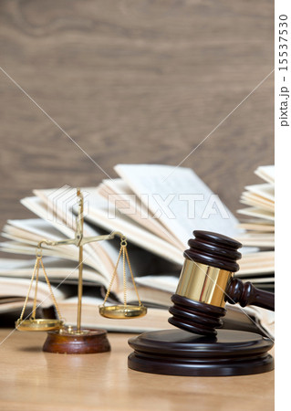 wooden gavel and books 15537530