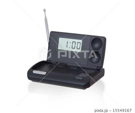 Old digital radio alarm clock isolated on white 15549167