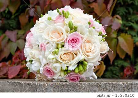 Bouquet of white, pink, cream roses 15550210