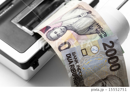 Indonesian rupiah money come out from calculator 15552751