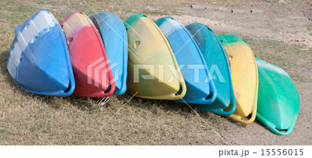 Colorful boat upside down on the shore 15556015