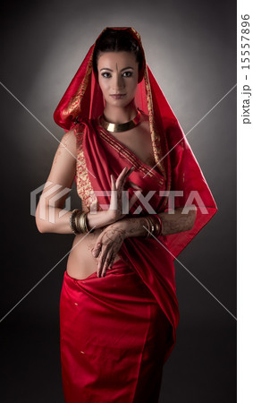 Sensual East woman dressed in sari. Mehndi art 15557896