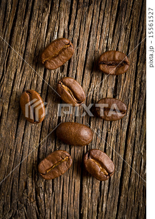 coffee beans on wooden background 15561527