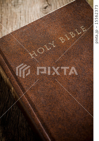 the Holy Bible on old wooden table 15562373