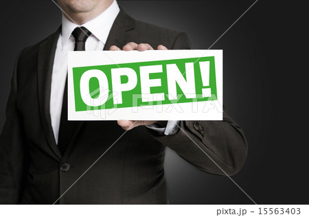 Open sign is held by businessman 15563403