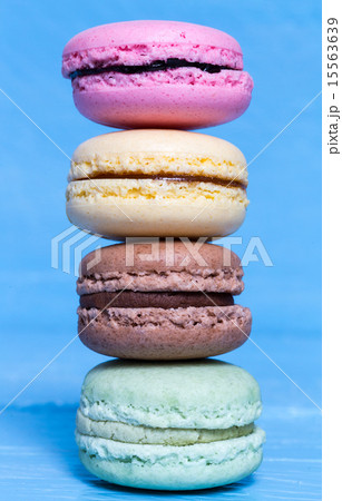 Colorful macarons on a blue wooden macro Colorful macarons on a blue wooden macro 15563639