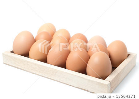 Closeup of Chicken eggs on the wooden plate 15564371