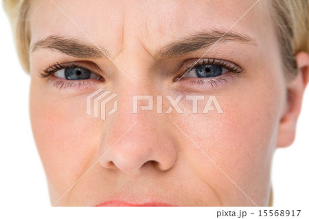Serious blond woman looking at camera Serious blond woman looking at camera 15568917