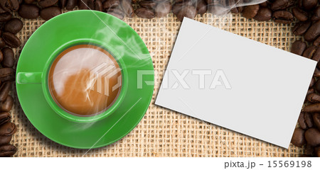 Composite image of green cup of coffee 15569198