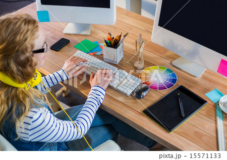 Designer typing on keyboard Designer typing on keyboard 15571133