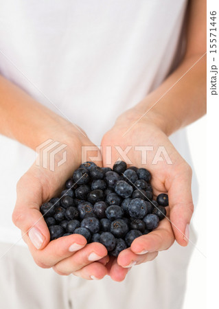 Woman holding blueberries 15571446
