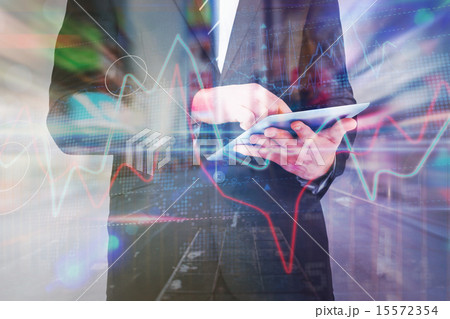 Composite image of businessman touching his tablet pc Composite image of businessman touching his tablet pc 15572354