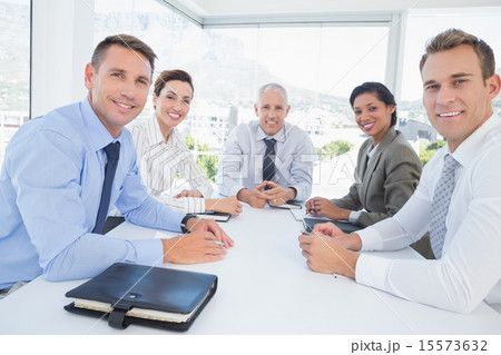 Business team sitting together around the table Business team sitting together around the table 15573632