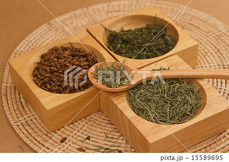 assortment of dry tea in wooden box 15589695