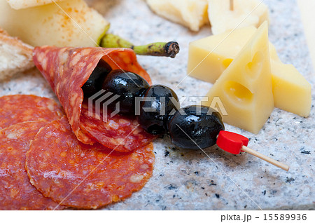 mix cold cut on a stone with fresh pears mix cold cut on a stone with fresh pears 15589936