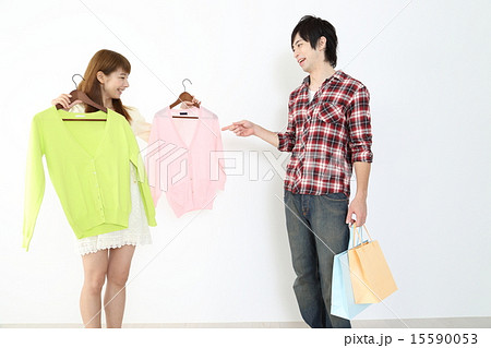 彼女の買い物に付き合う彼氏の写真素材