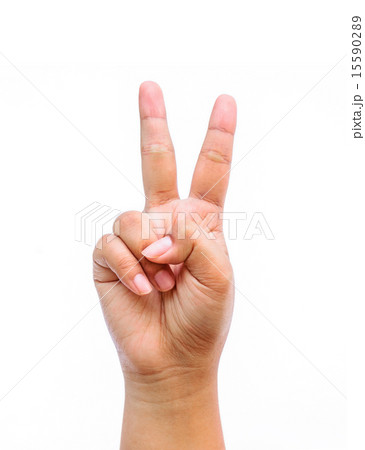Female hand sign victory isolated on white  15590289