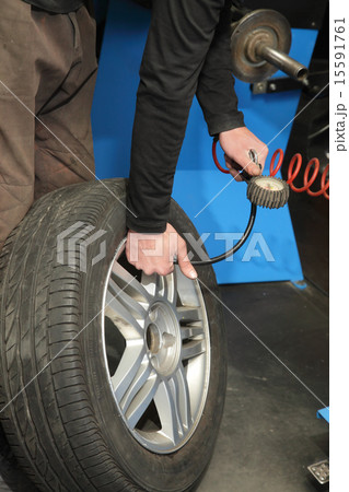 Car servicing, tire 15591761