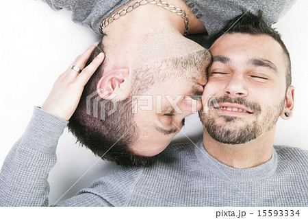 A homosexual couple over a white background A homosexual couple over a white background 15593334
