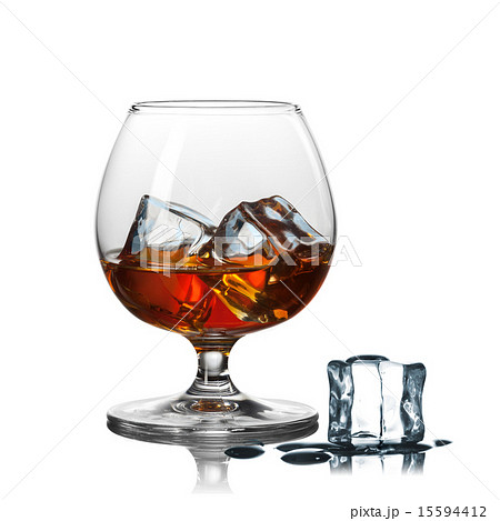 whiskey with ice in glass isolated on white whiskey with ice in glass isolated on white 15594412