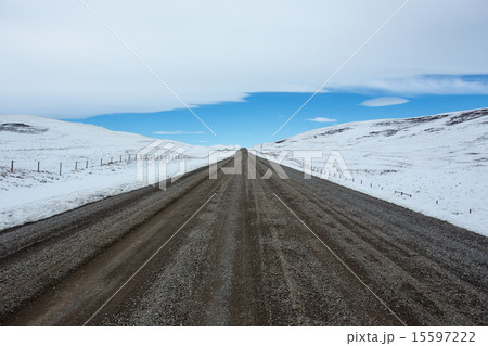 Gravel road and winter landscape 15597222