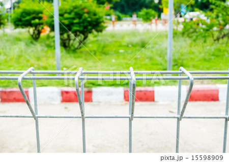 Wire fence at road and red line parking 15598909