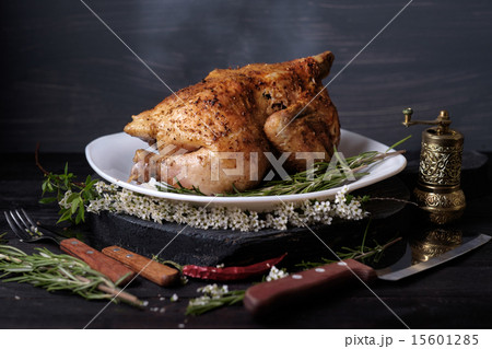 Roasted chicken with spices and herbs Roasted chicken with spices and herbs 15601285