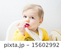 Cute baby eating 15602992