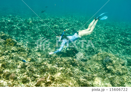 Woman with mask snorkeling 15606722