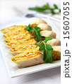 Rolls of lavash with onions, carrots and cheese 15607055