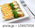 Rolls of lavash with onions, carrots and cheese 15607056
