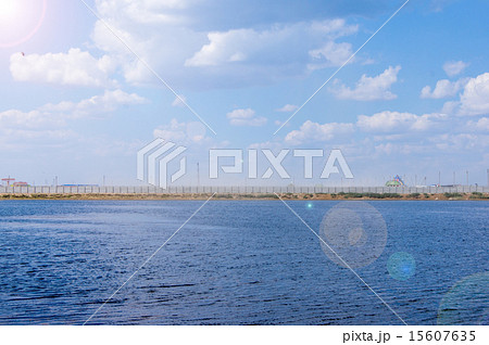 blue sea and cloudy sky over it 15607635