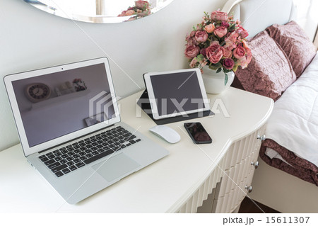 laptop with tablet and smart phone on table laptop with tablet and smart phone on table 15611307