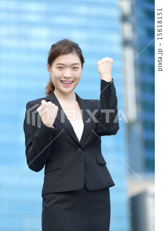 Successful Chinese businesswoman celebrate victory Successful Chinese businesswoman celebrate victory 15618151