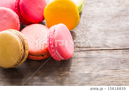 French colorful macarons on wood table French colorful macarons on wood table 15618830