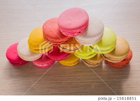 French colorful macarons on wood table French colorful macarons on wood table 15618851