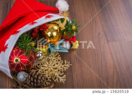 Santa Hat with Christmas decorations on wooden   15620519
