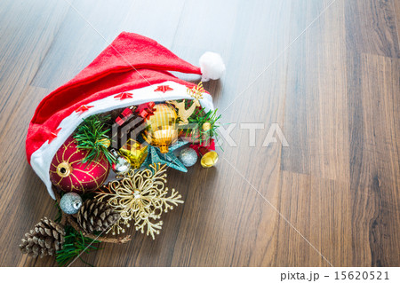 Santa Hat with Christmas decorations on wooden   15620521