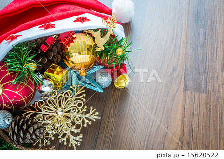 Santa Hat with Christmas decorations on wooden   15620522