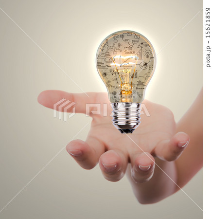 Hand holding light bulb with business concept 15621859
