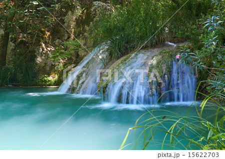Natural waterfall and lake in Polilimnio area. Greece 15622703